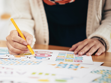 Let Richards help you build the best custom invitations for your event! Our helpful staff will help guide you through the process!

Image: A person (perhaps one of our helpful staff members) helps sort through a stack of papers, pencil in hand. 