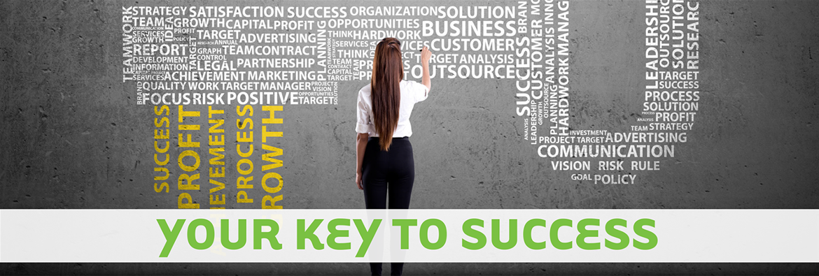 Woman stands at wall amidst word cloud elaborating on keys to success.